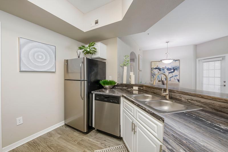 Stainless Steel Appliances | Your newly remodeled kitchen includes ample cabinet space and your very own laundry room.