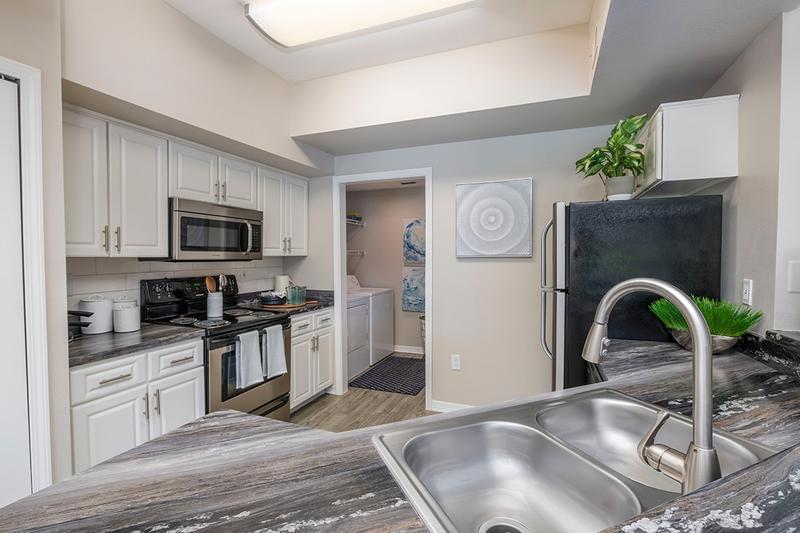 Newly Remodeled Kitchens | New remodeled kitchens featuring breakfast bars, granite-style counter tops, and stainless steel appliances.
