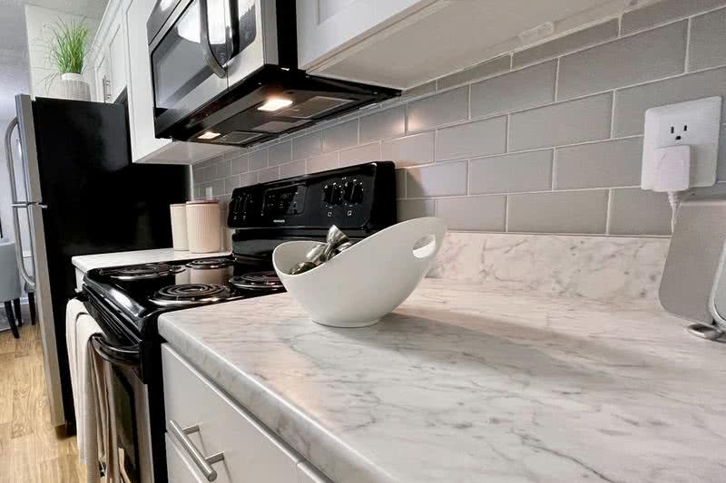 Modern Options Available | Modern updates with white countertops and subway tile available