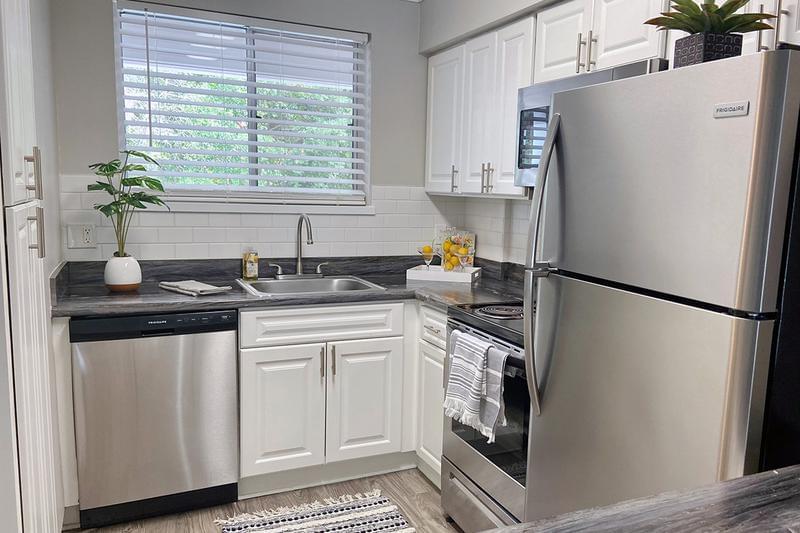 Newly Remodeled Kitchens with Stainless Steel Appliances | Newly remodeled kitchens with white cabinetry, and stainless steel appliances.