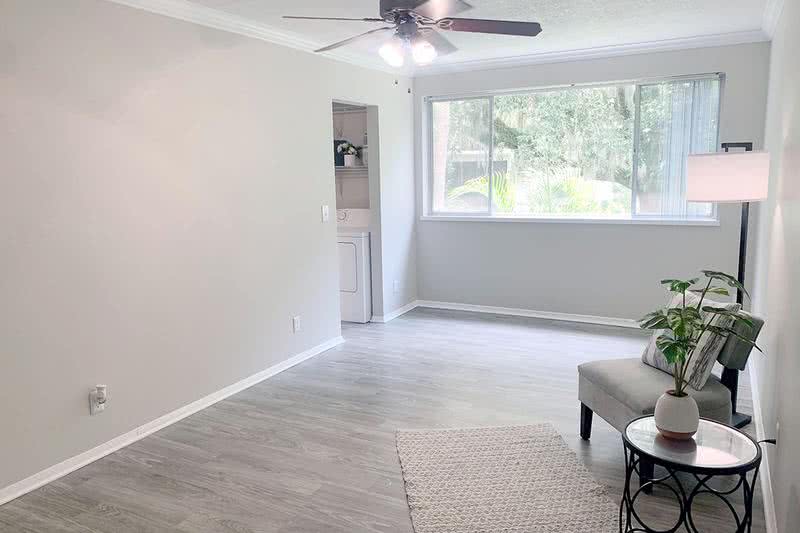 Studio Living Area | Our studio apartment homes feature spacious living areas with a ceiling fan.