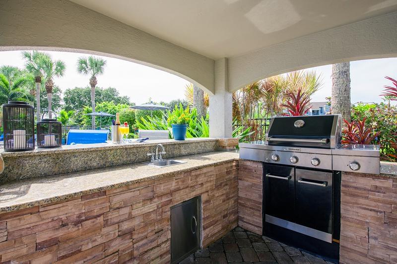 BBQ/Picnic Area | Take advantage of our poolside grill and kitchen to have a cookout with friends.