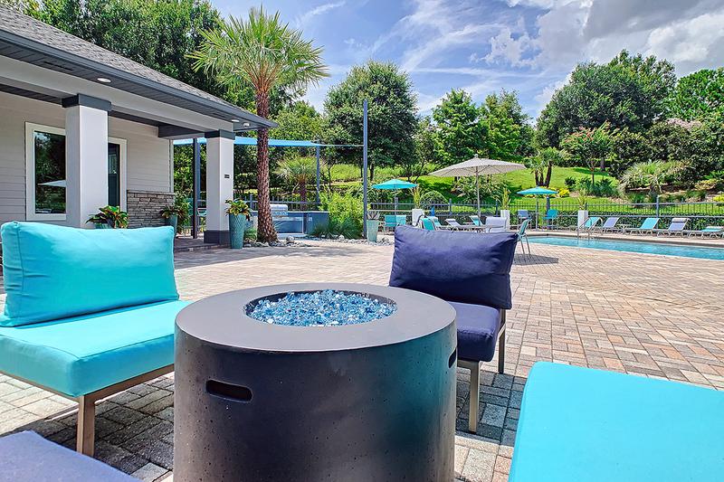 Fire Pit | Relax after a long day by our poolside fire pit.