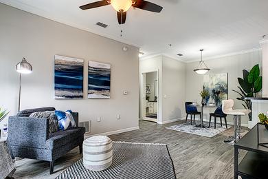 Open Floor Plans | Spacious, open floor plans with wood-style flooring.