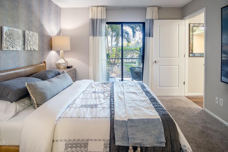Lanai Access | The Rivieria Master Suite has it's own private entrance to the screened in lanai.