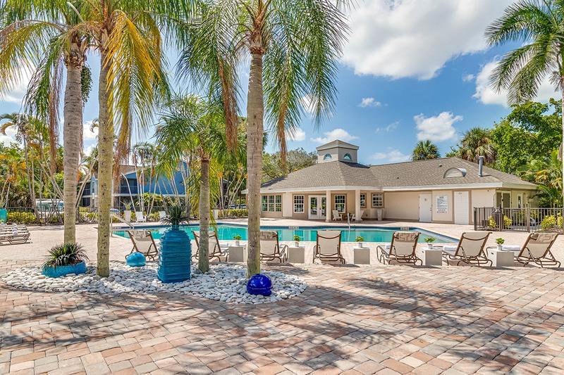 Expansive Sundeck | Both pools feature an expansive sundeck surrounded by beautiful landscaping.