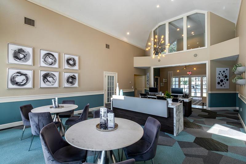 Leasing Office Interior | Enjoy a beautiful view of the pool as you enjoy a cup of coffee.