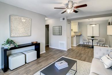Spacious Open Floor Plans | You'll love our spacious, open floor plans which feature wood-style flooring.