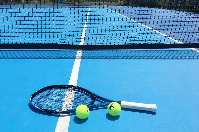Tennis Court | Enjoy some fun in the sun while playing a game of tennis here at Adele Place.