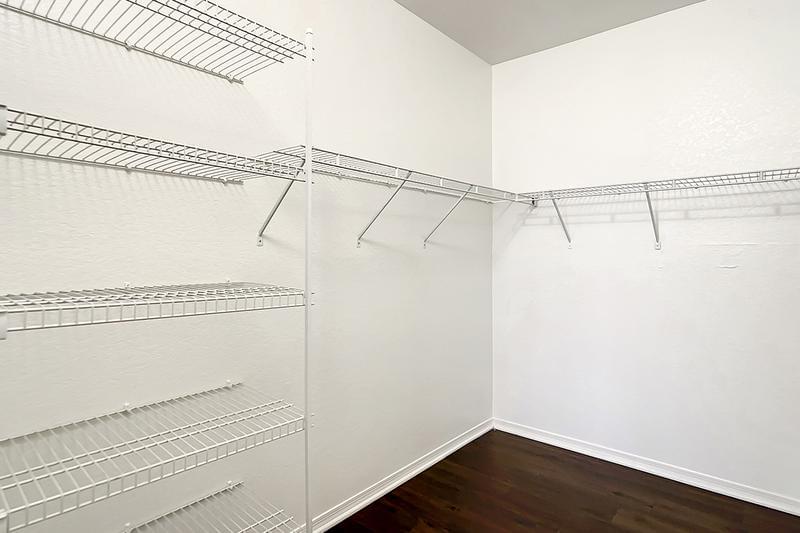 Walk-In Closet | Our walk-in closets with built-in organizers have plenty of space for you to store all your clothing.