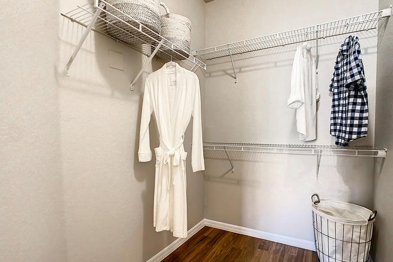 Walk-In Closet | Walk-in closets with built-in organizers.