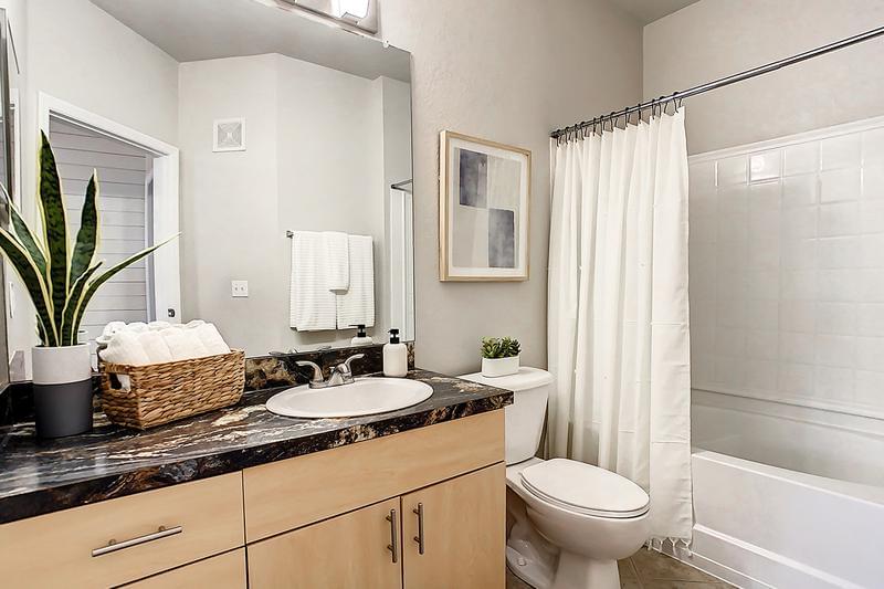 Master Bathroom | Master bedrooms also feature a master bathroom featuring oversized mirrors. 