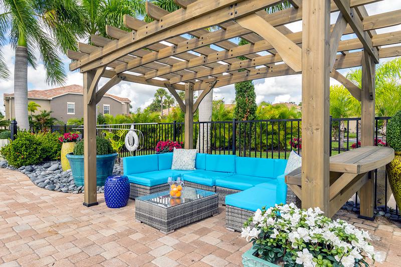 Poolside Pergola | Relax under our poolside pergola on our expansive sundeck.