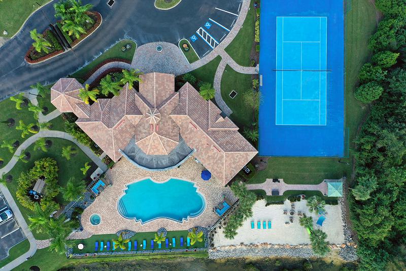 Aerial View of Amenities | Enjoy all of our resort-style amenities including a pool, private beach area with firepit, and a tennis court.