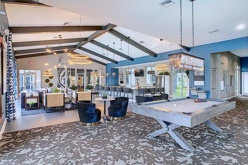 Clubhouse Interior | Expansive clubhouse featuring a billiards room, full kitchen and fitness center.