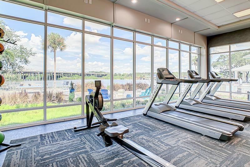 Waterfront Fitness Center | Our fitness center features cardio equipment including treadmills and spinning bikes.