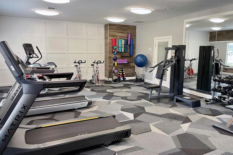 Cardio & Weight Training Equipment | Our fitness center includes plenty of cardio and weight training machines for you to get in your workout.