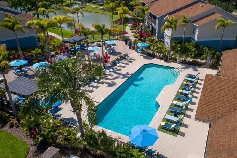 Pool Area | Our expansive sundeck/pool area includes plenty of loungers, tables with umbrellas, and other seating. 