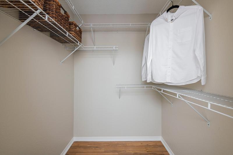 Spacious Closets with Built-in Organizers | Our spacious closets with built-in organizers offer all the room you need to store all your clothing.