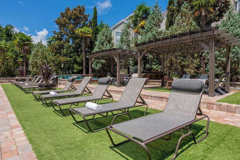 Poolside Loungers | Relax in one of our poolside loungers or cabanas located around the pool area.