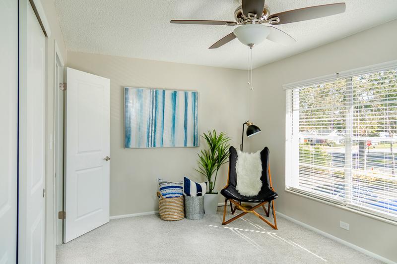 Primary Bedroom | Your primary bedroom features a spacious walk-in closet with built-in organizers and a ceiling fan.