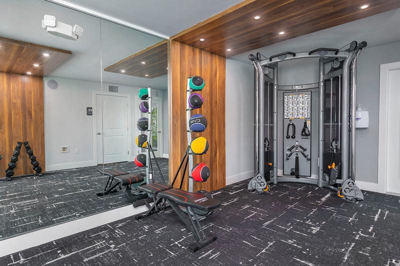 Weight Training Equipment | Our fitness center features weight training equipment.