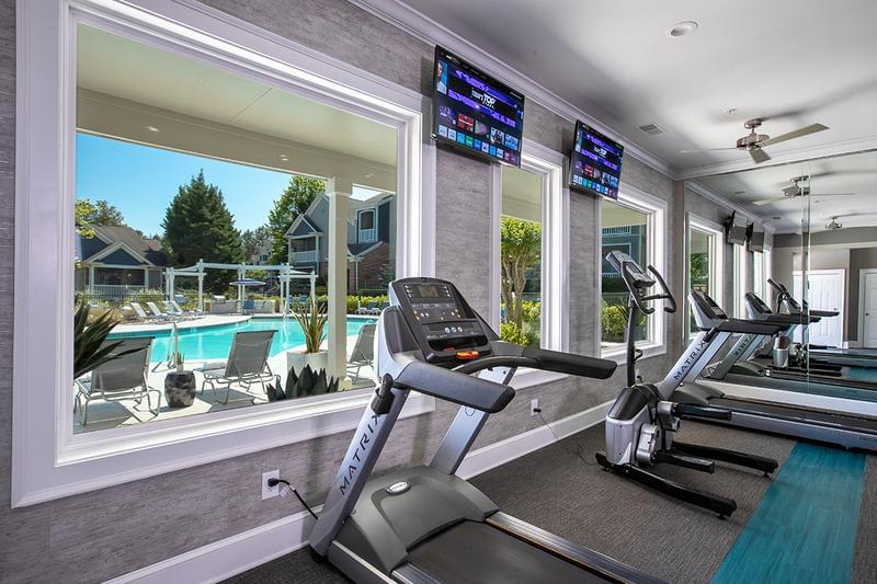 Cardio Equipment- Amazing Upgrades Coming Spring 2023! | Work on your cardio while enjoying beautiful views of the pool.