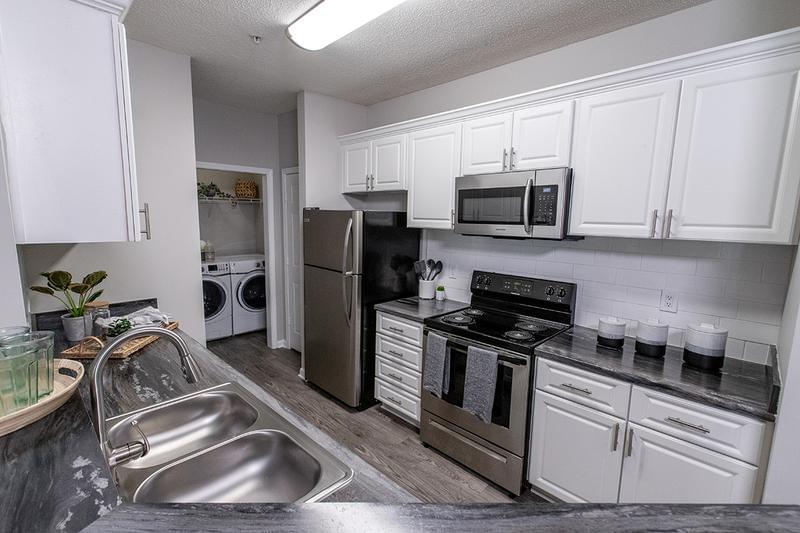 Stainless Steel Appliances | Kitchens feature stainless steel appliances, microwave included.