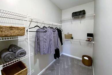 Walk-In Closet | Spacious walk-in closets with built-in organizers.