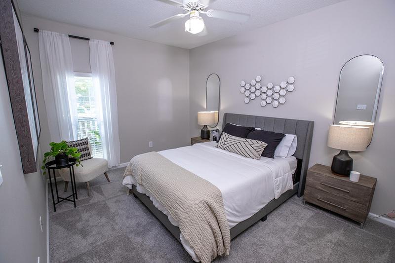 Master Bedroom | The master bedrooms feature plush grey carpeting, and spacious walk-in closets.