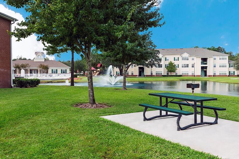 Picnic Area | Have a cook out at our picnic area featuring a picnic table and a charcoal grill.