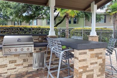 Outdoor Kitchen | Cook out at our outdoor kitchen featuring a gas grill. 