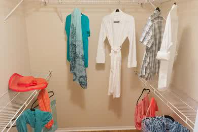 Walk-In Closets | Spacious walk-in closets with built-in organizers.