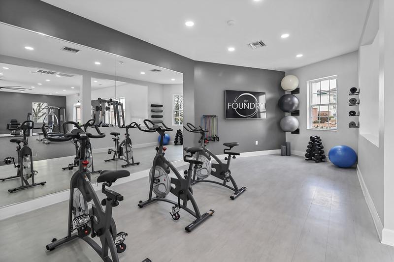 Spin Bikes & Yoga | Our fitness center also features multiple spin bikes and yoga equipment