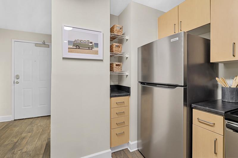 Built-In Pantry | Kitchens come fully applianced and features a built-in pantry area and breakfast bar.