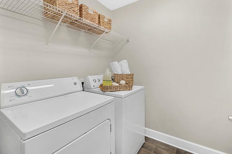 In-Home Laundry Room | All floor plans feature full-size washer and dryer appliances.