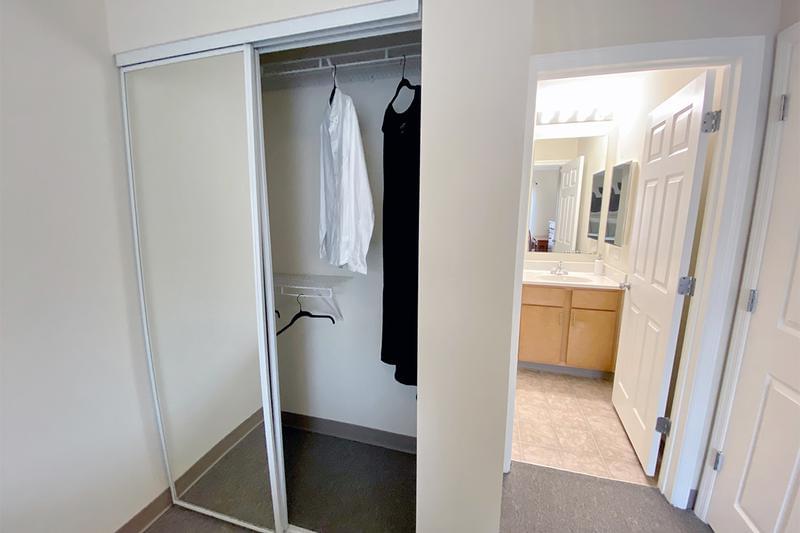 Closets with Built-in Organizers | You'll love our spacious closets with built-in organizers and sliding mirror doors.