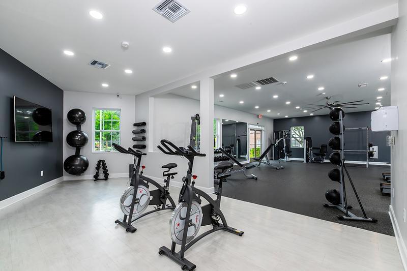 Spin Bikes & Yoga | Our fitness center features multiple spin bikes and yoga equipment.