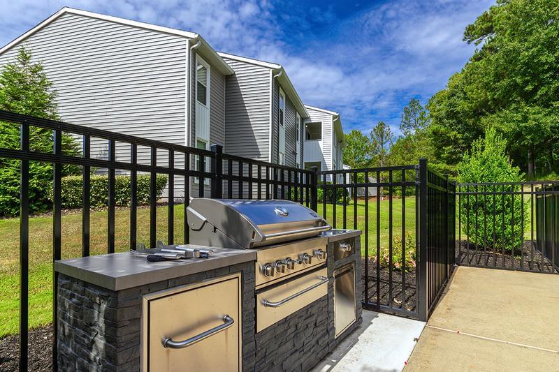 Outdoor Kitchen | Have a cookout by the pool at our outdoor kitchen with gas grill.