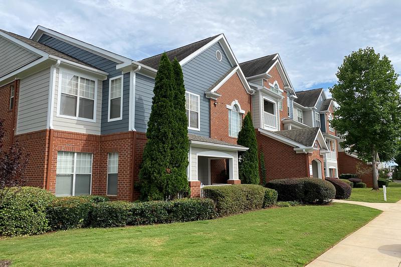 Freshly Painted Buildings | You'll be welcomed home with lush landscaping throughout our community. 