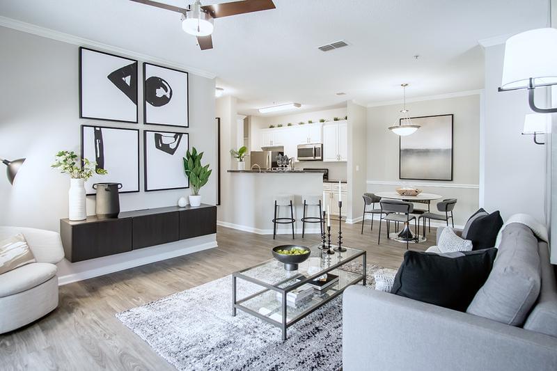 Open Floor Plans | Floor plans feature a spacious open layout, wood-style flooring or carpet and multi-speed ceiling fans.