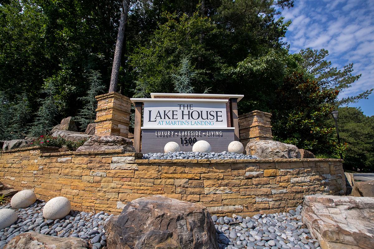 Welcome home to The Lake House at Martin's Landing offering Lakeside living on Martin Lake.
