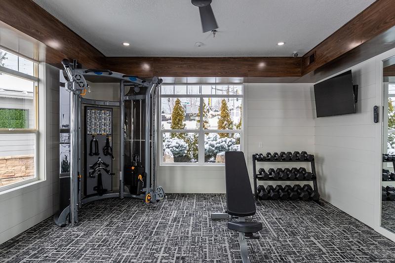 Weight Training Equipment | Our fitness center also features plenty of weight training equipment, so you can get a full body workout.