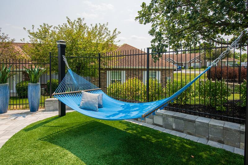 Hammocks | Lay out and catch up on a good book while lounging in our poolside hammocks.