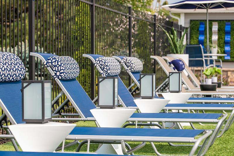 Poolside Loungers | Soak in the sun from one of our poolside loungers.