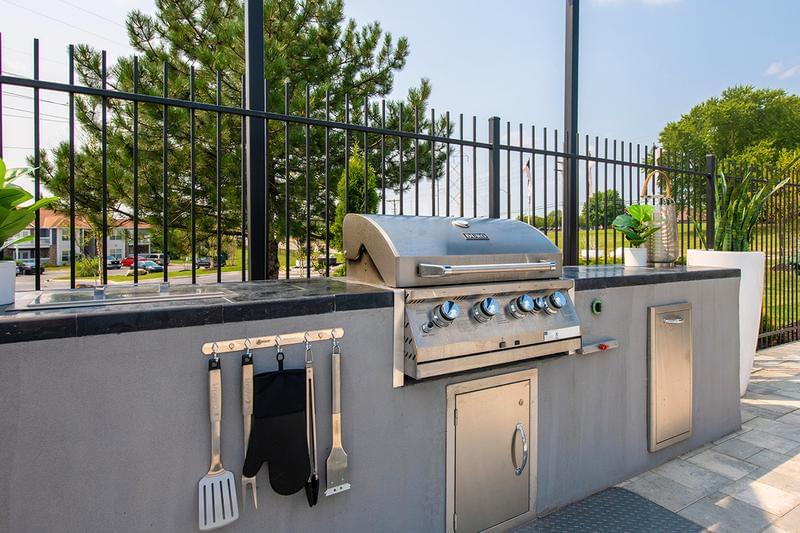 Outdoor Kitchen | Cook out with our gas grill at our outdoor kitchen located within the pool area.