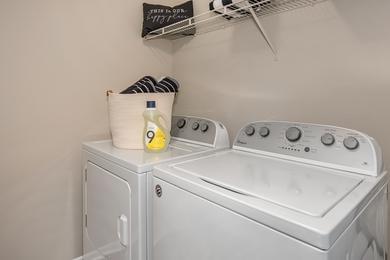 Full Size Washer & Dryer | Apartments homes are complete with full size washer and dryer appliances for your conevenience. 
