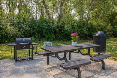 Picnic Area | Cook out with friends and family at our picnic area featuring a charcoal grill. 