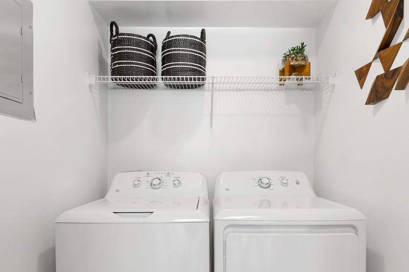 Full Size Washer and Dryer | Every apartment home comes with a laundry room with storage space and a full size washer and dryer included!