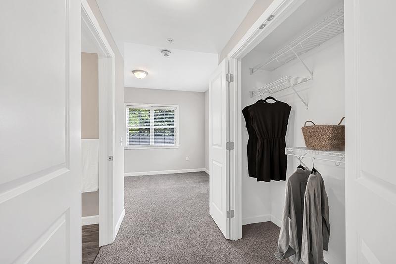 4 Bed 4 Bath Bedroom Closet | Our 4 bed 4 bath floor plans feature a walk though closet leading to your bedroom.